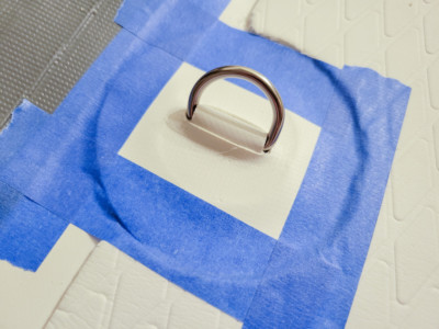 Securing glued patch